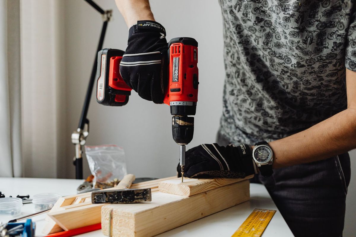 Handyman performing home maintenance in Lake Grove