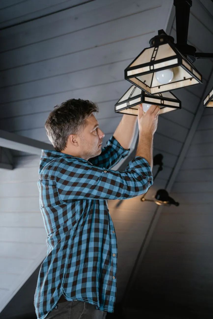 Handyman completing a home repair in a Palisades neighborhood home